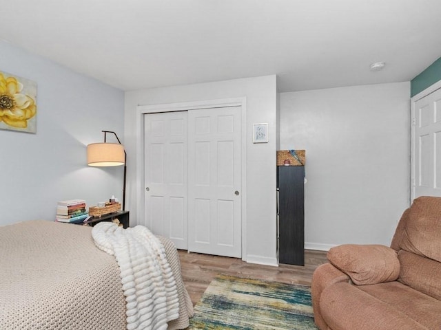 48 Twin Brook Ln, Taunton, MA 02780 - bedroom with wood finished floors, a closet, and baseboards