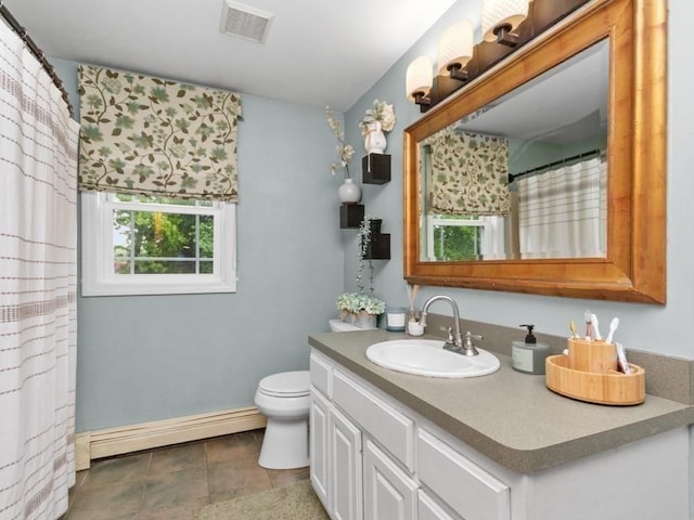 48 Twin Brook Ln, Taunton, MA 02780 - full bath with baseboard heating, vanity, toilet, baseboards, and tile patterned floors