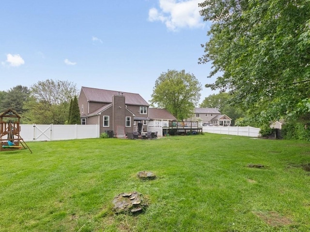 48 Twin Brook Ln, Taunton, MA 02780 - back of property featuring a playground and a wooden deck