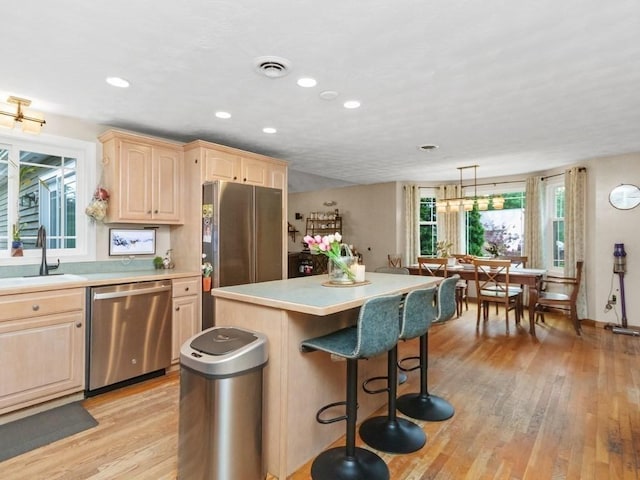 48 Twin Brook Ln, Taunton, MA 02780 - kitchen featuring appliances with stainless steel finishes, a sink, light brown cabinets, light countertops, and recessed lighting