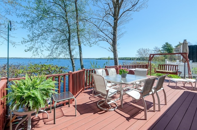 wooden terrace with a water view