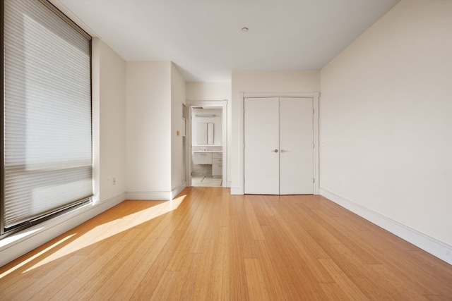 unfurnished bedroom featuring light hardwood / wood-style floors