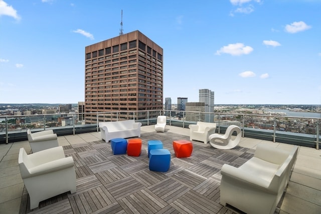 view of patio / terrace with an outdoor living space and a balcony