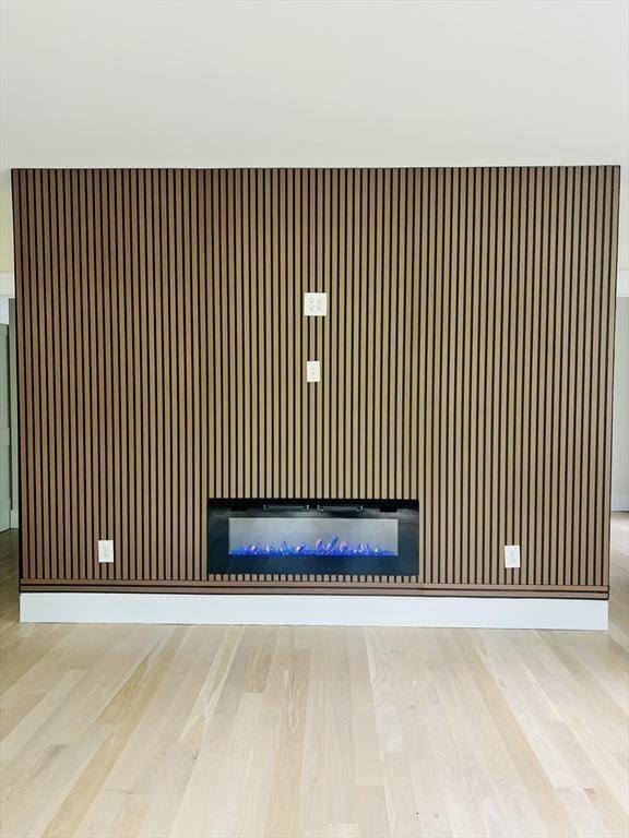 1 Harvard Ave, Burlington, MA 01803 - detailed view of wood finished floors and a fireplace