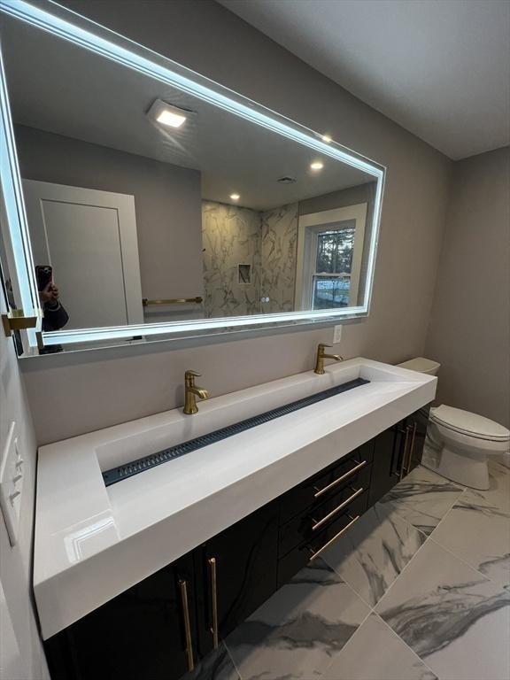 1 Harvard Ave, Burlington, MA 01803 - bathroom featuring double vanity and marble finish floors