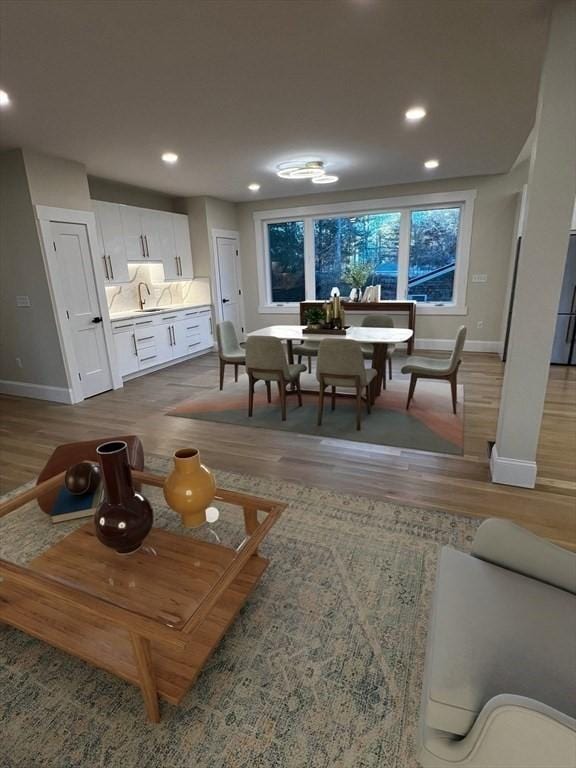 1 Harvard Ave, Burlington, MA 01803 - living area with light wood-type flooring and recessed lighting