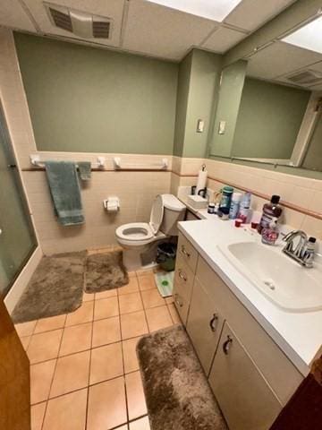 139 Westmoor Rd, Boston, MA 02132 - bathroom featuring a drop ceiling, vanity, a shower stall, and tile patterned floors
