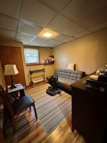 139 Westmoor Rd, Boston, MA 02132 - living area with wood finished floors and a paneled ceiling