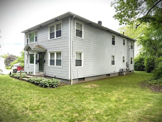 11 Park Rd, Webster, MA 01570 - rear view of property featuring a yard and a chimney