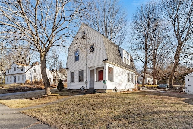 view of front of house with a front lawn