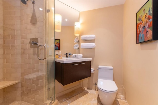 full bathroom with toilet, a shower stall, and vanity