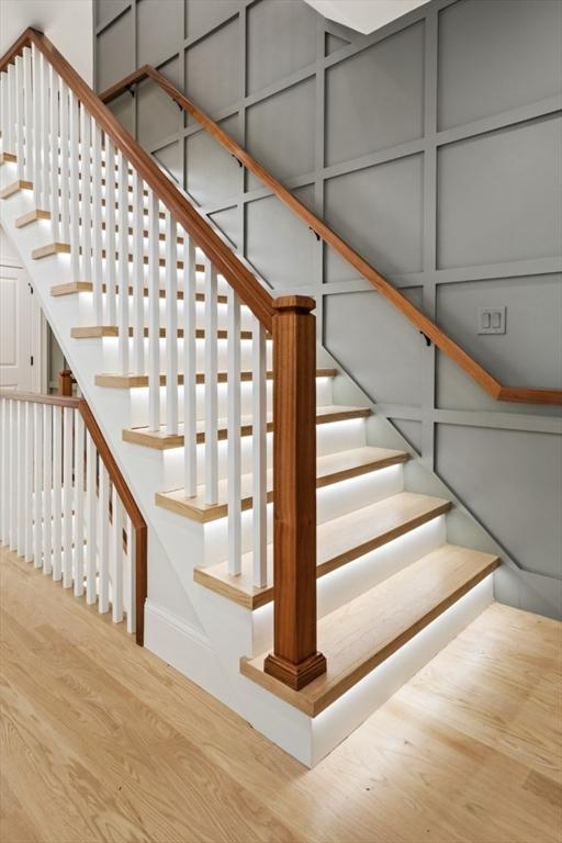 45 Sargent Ave, Somerville, MA 02145 - stairs with wood finished floors and baseboards
