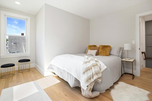 45 Sargent Ave, Somerville, MA 02145 - bedroom featuring wood finished floors, baseboards, and recessed lighting