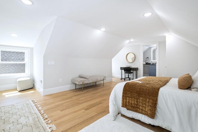 45 Sargent Ave, Somerville, MA 02145 - bedroom with vaulted ceiling, light wood finished floors, baseboards, and recessed lighting