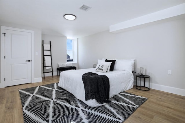 45 Sargent Ave, Somerville, MA 02145 - bedroom featuring wood finished floors and baseboards