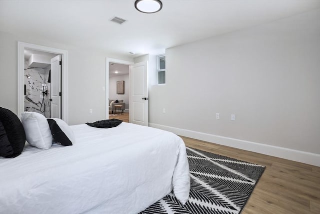 45 Sargent Ave, Somerville, MA 02145 - bedroom featuring wood finished floors and baseboards