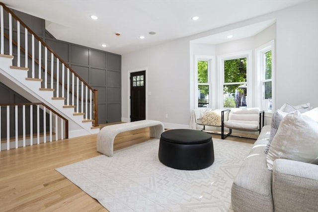 45 Sargent Ave, Somerville, MA 02145 - living room with wood finished floors, recessed lighting, baseboards, and stairs