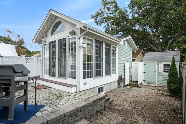 view of property exterior featuring a patio