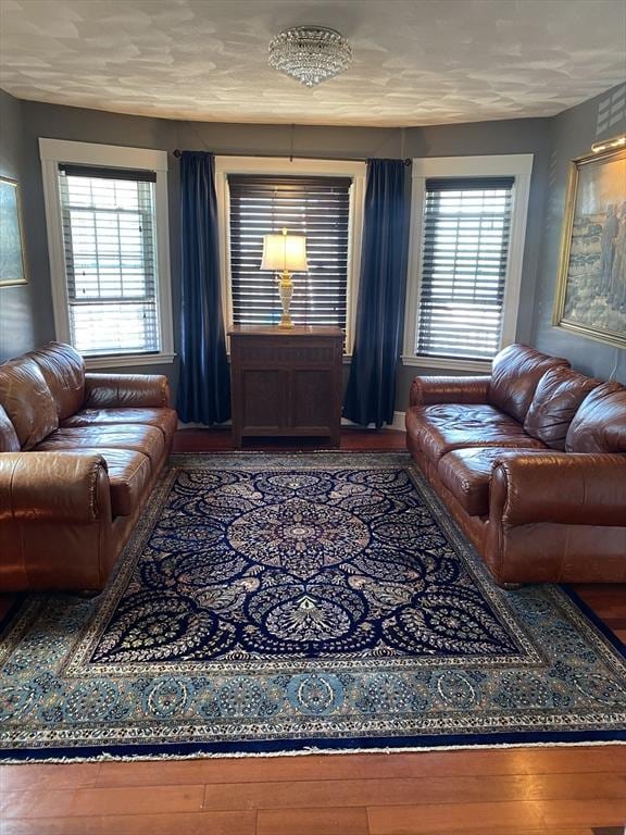 876 Shirley Unit 1, Winthrop, MA 02152 - living area with healthy amount of natural light and wood finished floors