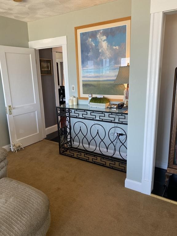 876 Shirley Unit 1, Winthrop, MA 02152 - carpeted bedroom with baseboards