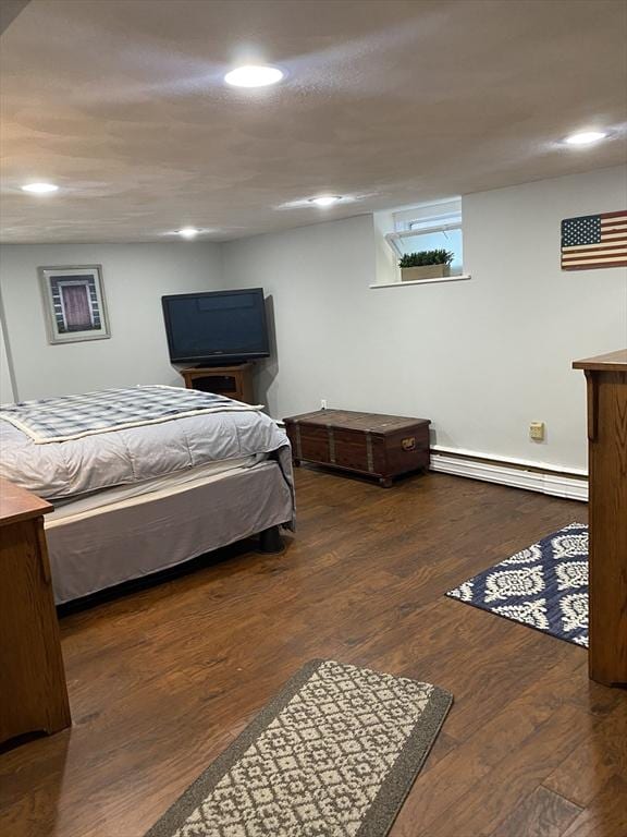 876 Shirley Unit 1, Winthrop, MA 02152 - bedroom with a baseboard radiator, wood finished floors, and recessed lighting