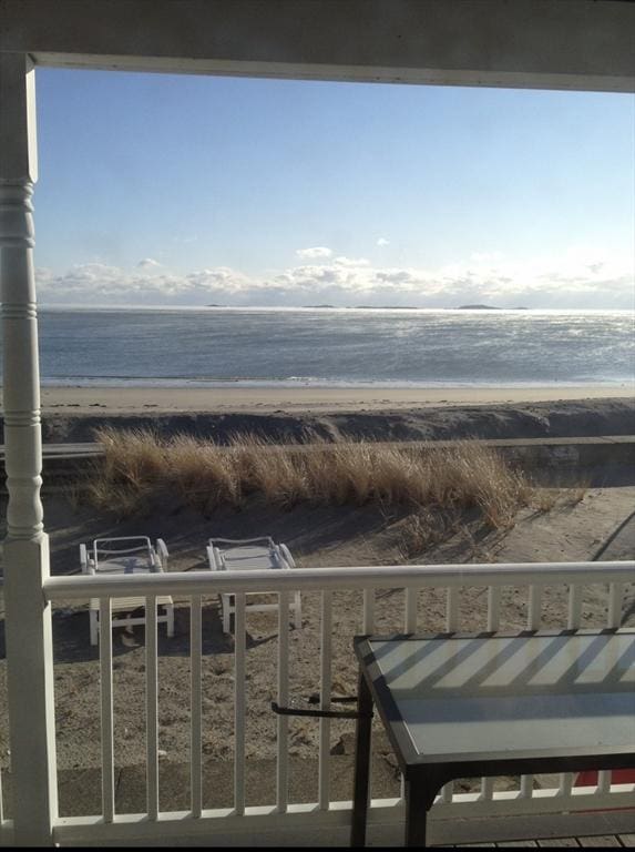 876 Shirley Unit 1, Winthrop, MA 02152 - balcony featuring view of water and beach