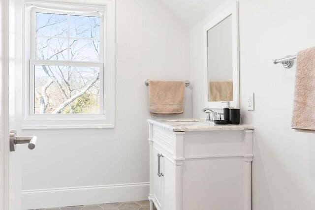 1 Marlin Rd, Boston, MA 02132 - bathroom featuring baseboards, a wealth of natural light, tile patterned flooring, and vanity