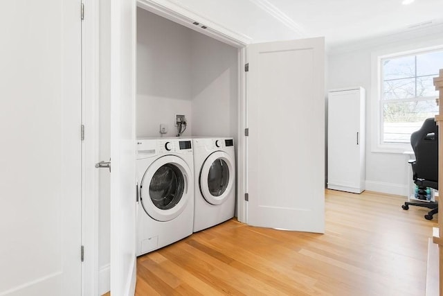 1 Marlin Rd, Boston, MA 02132 - clothes washing area featuring light wood finished floors, laundry area, crown molding, and independent washer and dryer