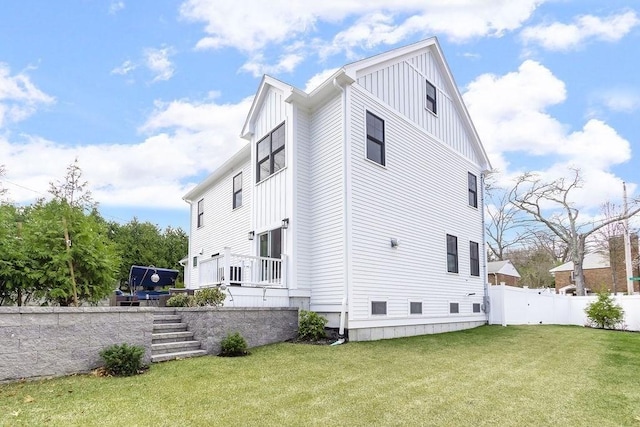1 Marlin Rd, Boston, MA 02132 - view of property exterior with a yard, fence, stairway, and board and batten siding