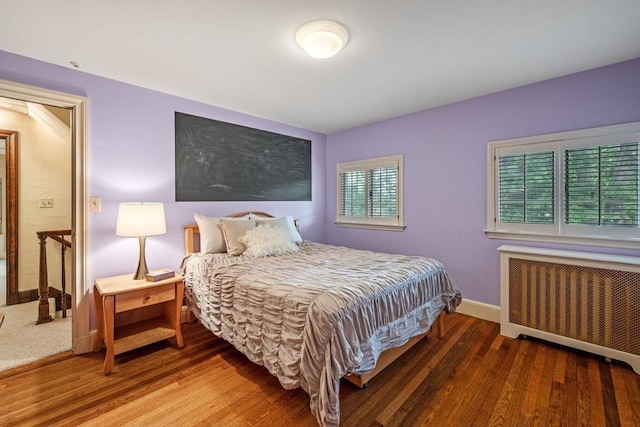 170 Atlantic Ave, Swampscott, MA 01907 - bedroom with radiator heating unit and wood finished floors