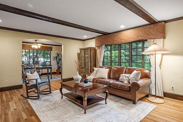 170 Atlantic Ave, Swampscott, MA 01907 - living room with arched walkways, beamed ceiling, wood finished floors, recessed lighting, and a ceiling fan