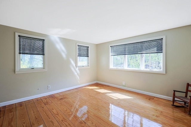 6 Hillside Rd, Holland, MA 01521 - empty room featuring plenty of natural light, light wood finished floors, and baseboards