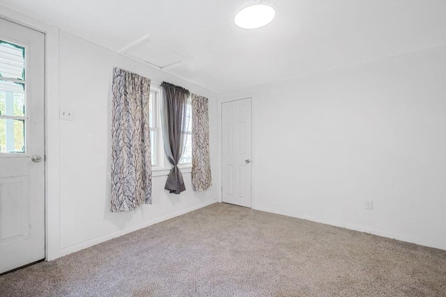 6 Hillside Rd, Holland, MA 01521 - spare room featuring carpet flooring, attic access, and baseboards