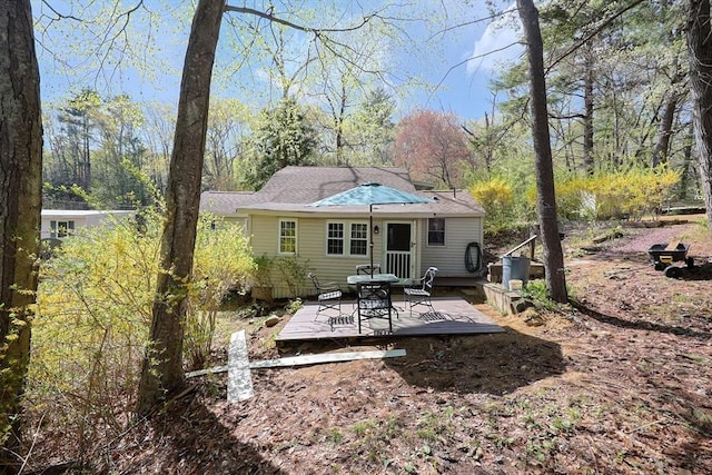 6 Hillside Rd, Holland, MA 01521 - rear view of house with a deck