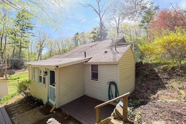 6 Hillside Rd, Holland, MA 01521 - back of house with roof with shingles and a deck