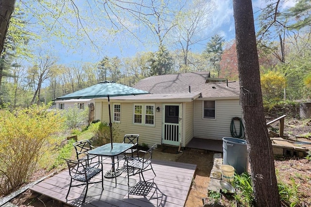 6 Hillside Rd, Holland, MA 01521 - rear view of property with a wooden deck and outdoor dining area