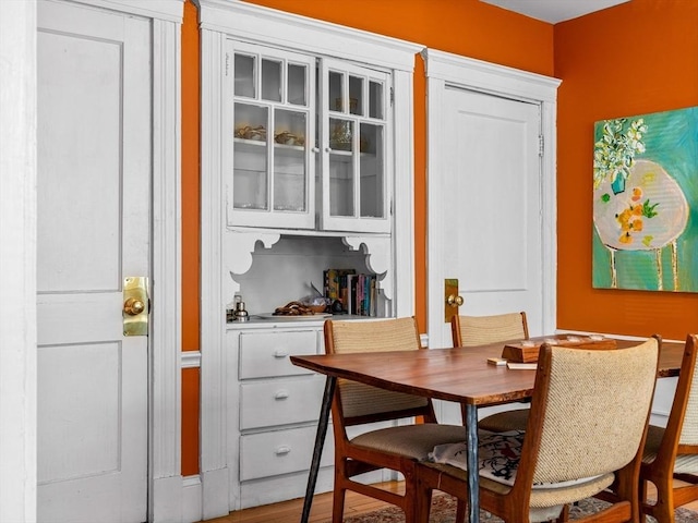 dining area featuring wood finished floors