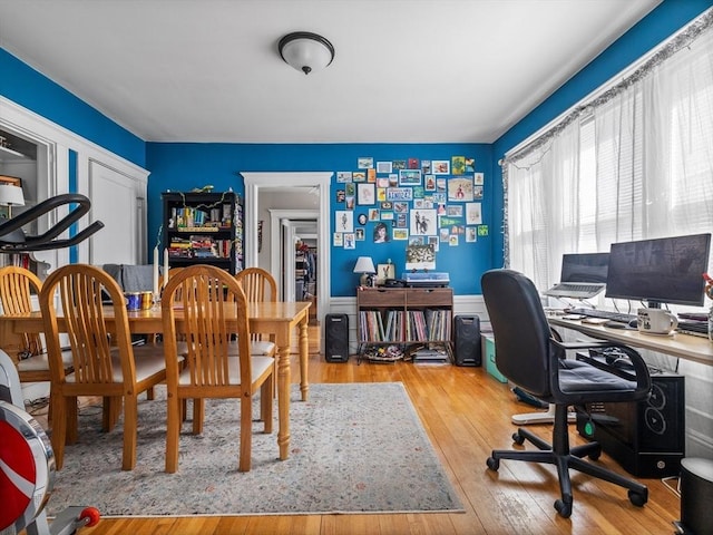 office space with hardwood / wood-style floors