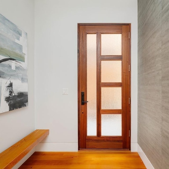 doorway with light hardwood / wood-style flooring