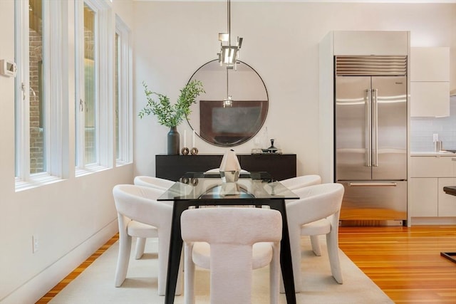 dining room featuring light hardwood / wood-style floors