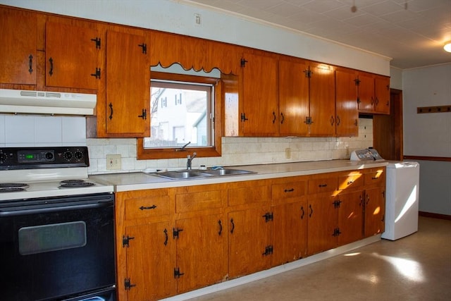 kitchen with washer / dryer, white range with electric stovetop, tasteful backsplash, and sink