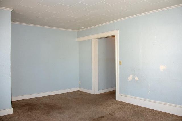 carpeted empty room with ornamental molding