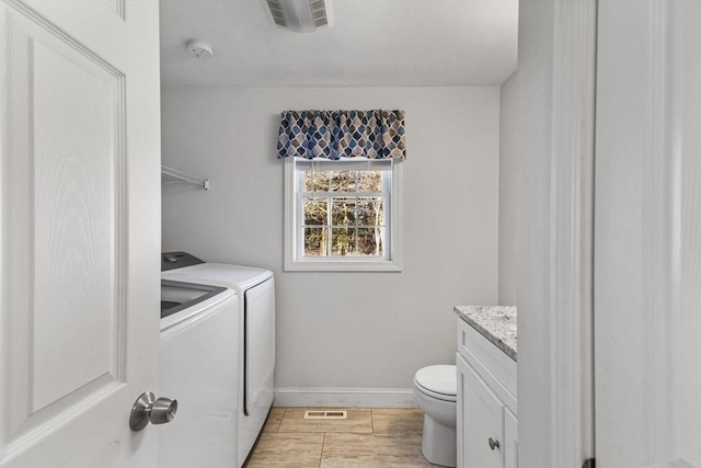 laundry area featuring independent washer and dryer