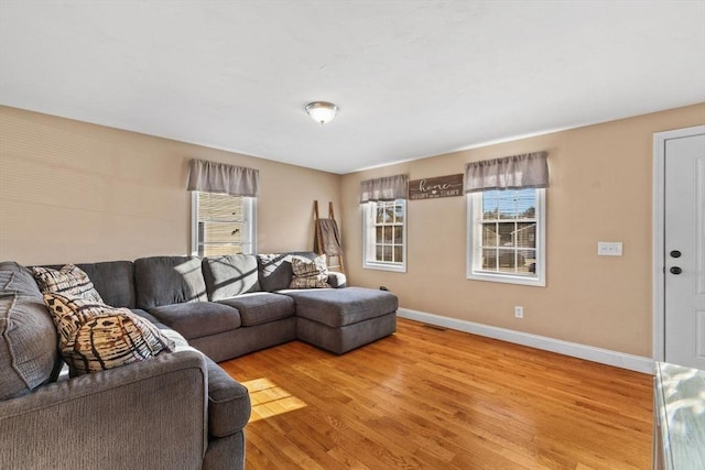 living room with light hardwood / wood-style floors