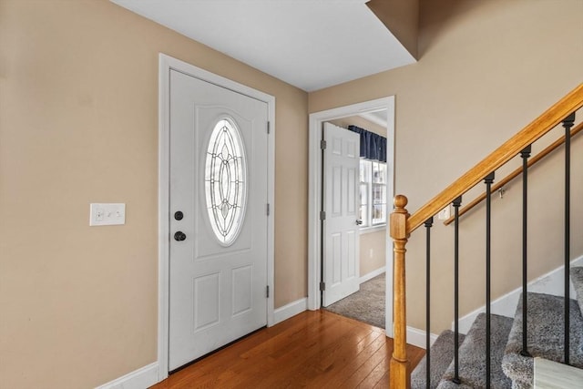 entrance foyer with hardwood / wood-style floors