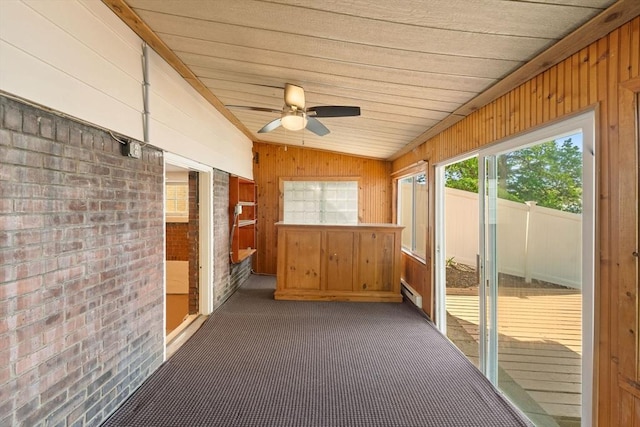 49 Bay View Dr, Shrewsbury, MA 01545 - unfurnished sunroom featuring vaulted ceiling, a baseboard radiator, and a ceiling fan