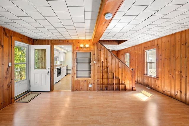 49 Bay View Dr, Shrewsbury, MA 01545 - entryway featuring wooden walls, wood finished floors, and stairs