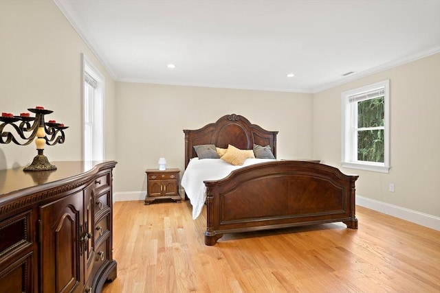 11 Broadway St Unit 2, Stoneham, MA 02180 - bedroom featuring light wood-style floors, ornamental molding, and recessed lighting