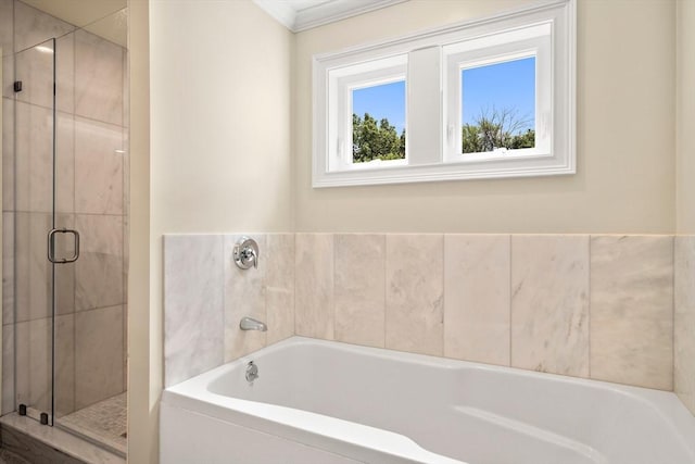 11 Broadway St Unit 2, Stoneham, MA 02180 - bathroom with a bath, a shower stall, and ornamental molding