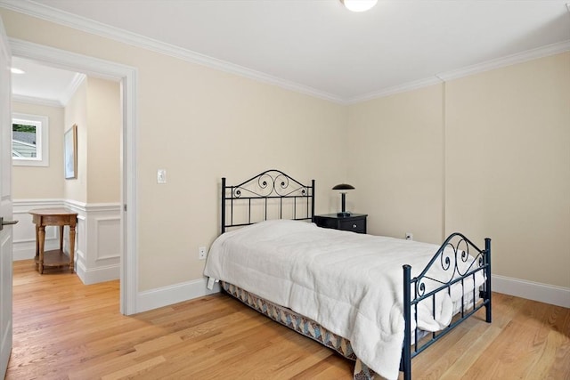 11 Broadway St Unit 2, Stoneham, MA 02180 - bedroom featuring light wood-style floors and ornamental molding